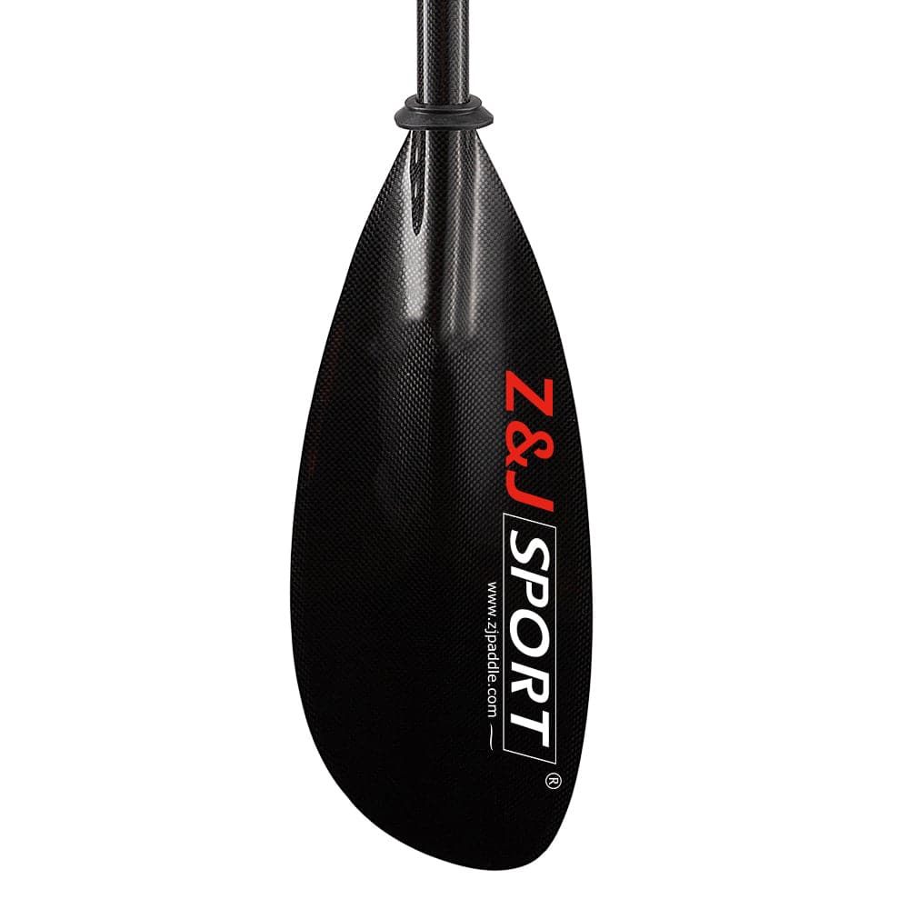 A black carbon fiber sea kayak paddle blade with a high-angle dynamic design from ZJ SPORT, featuring an asymmetrical shape, textured surface, and red and white Z&J SPORT text with a website below, perfect for long-distance paddling.