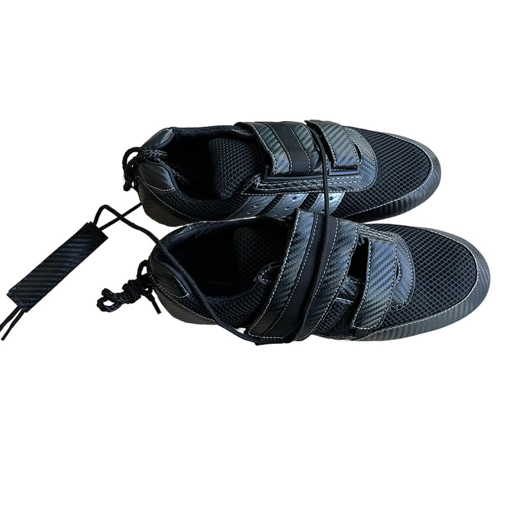 Two sleek ZJ SPORT rowing shoes in black with Velcro straps sit side by side, featuring a stylish design with mesh fabric and textured soles but lacking waterproofing. A hanging tag offers insights into the ZJ High Quality Rowing Shoes For Rowing Boat details.