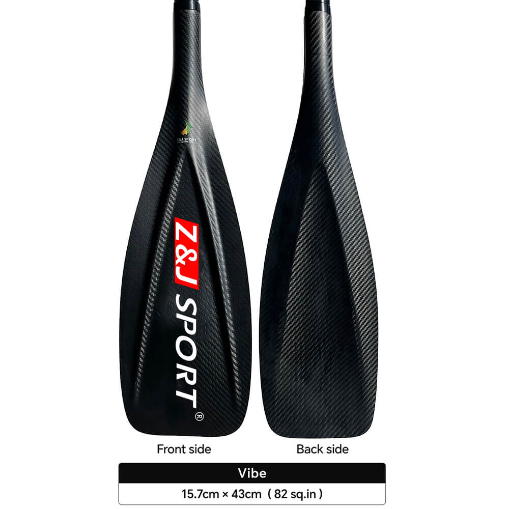 Two carbon fiber canoe paddles labeled Front side and Back side feature the red and white ZJ SPORT logo. They are part of the ZJ fixed multi-piece Carbon Sup Paddle with Vibe Blade, measuring 15.7cm x 43cm (82 sq.in), with a V-shaped rib for enhanced stroke stability.