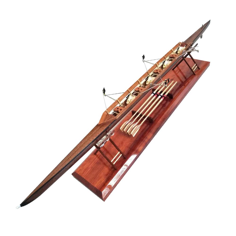 The ZJ Handcrafted Rowing Boat Model Miniatures by zijie is a sleek outrigger canoe on a wooden base, showcasing intricate features like paddles and rigging with supportive beams for an elegant maritime display.