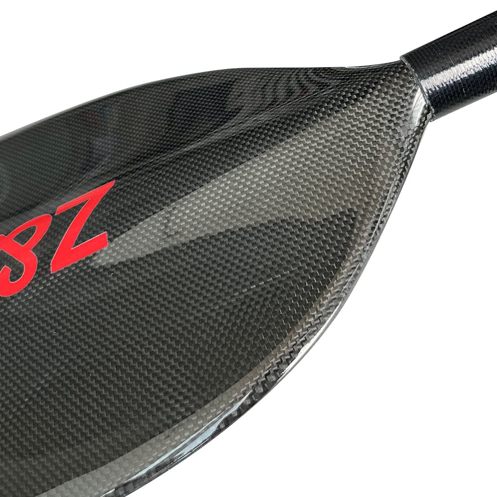 A close-up of the ZJ SPORT Full Carbon Fiber Flatwater Canoe Paddle showcases a glossy, woven texture on the blade, with 3Z in red on the upper left side.