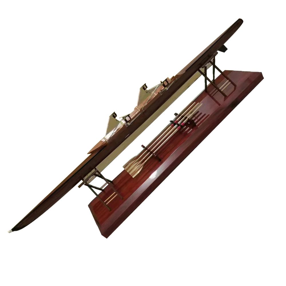 The ZJ Handcrafted Rowing Boat Model Miniature by zijie, reminiscent of a sleek kayak with its elongated design, is displayed elegantly on a polished wooden base and comes with a set of oars.