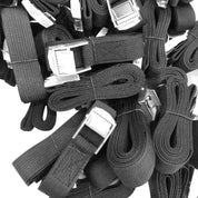 A stack of ZJ SPORT High Quality Durable Cam Locking Buckle Tie Down Straps, coiled and neatly arranged, ideal for securing items such as surfboards. Each set includes 6 black straps with silver buckle closures by ZJ SPORT.