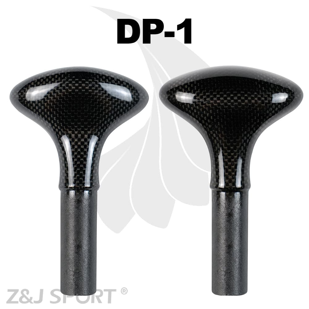 Close-up of two identical ZJ Lightweight Prepreg Carbon Handles for Dragon Boat Paddle on a white background. Made with premium carbon, they feature a black, textured look and glossy finish. The ZJ SPORT logo is in the bottom left corner, promising an exceptional shopping experience.