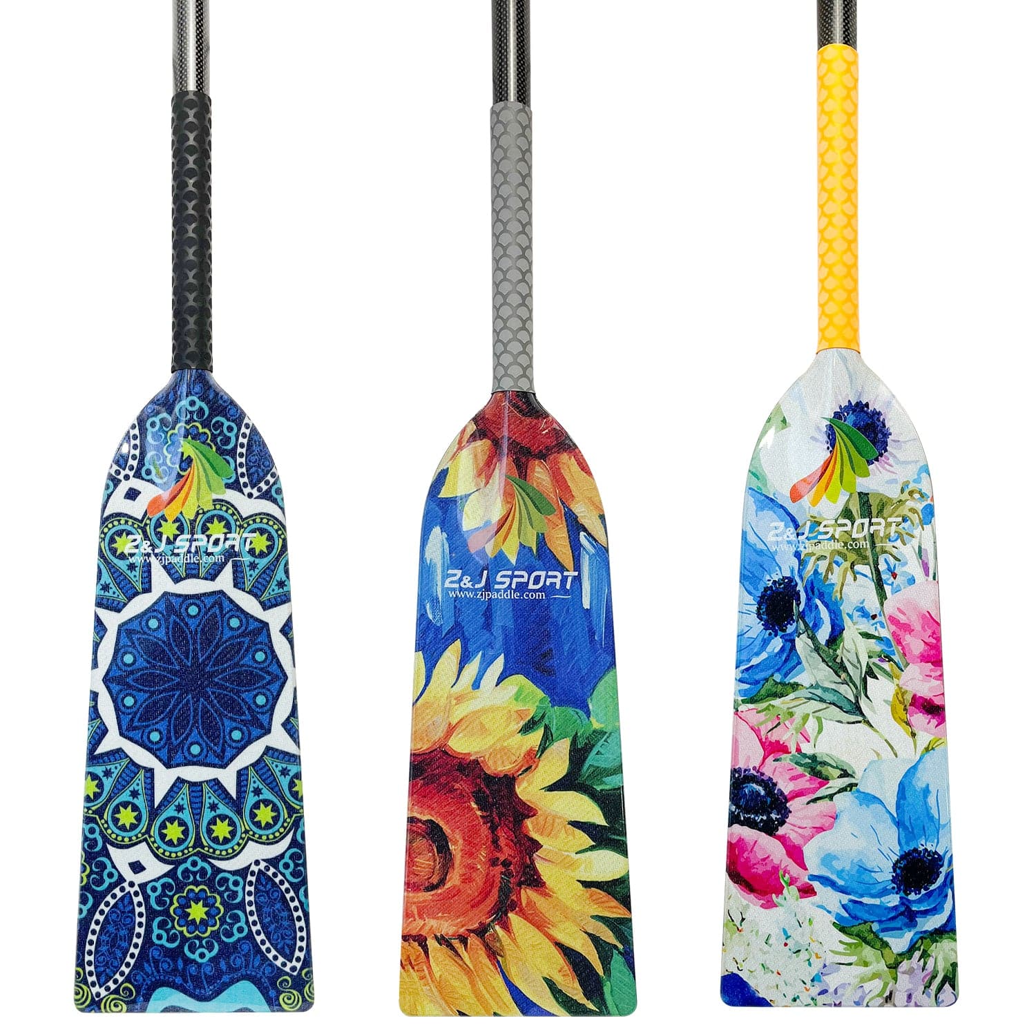 ZJ SPORTs lightweight paddles feature colorful designs: one with a blue geometric pattern, another with a large sunflower on blue, and the third showcasing vibrant red, blue, and yellow floral prints. All have the ZJ Antiskid Grip Wrap for secure handling.