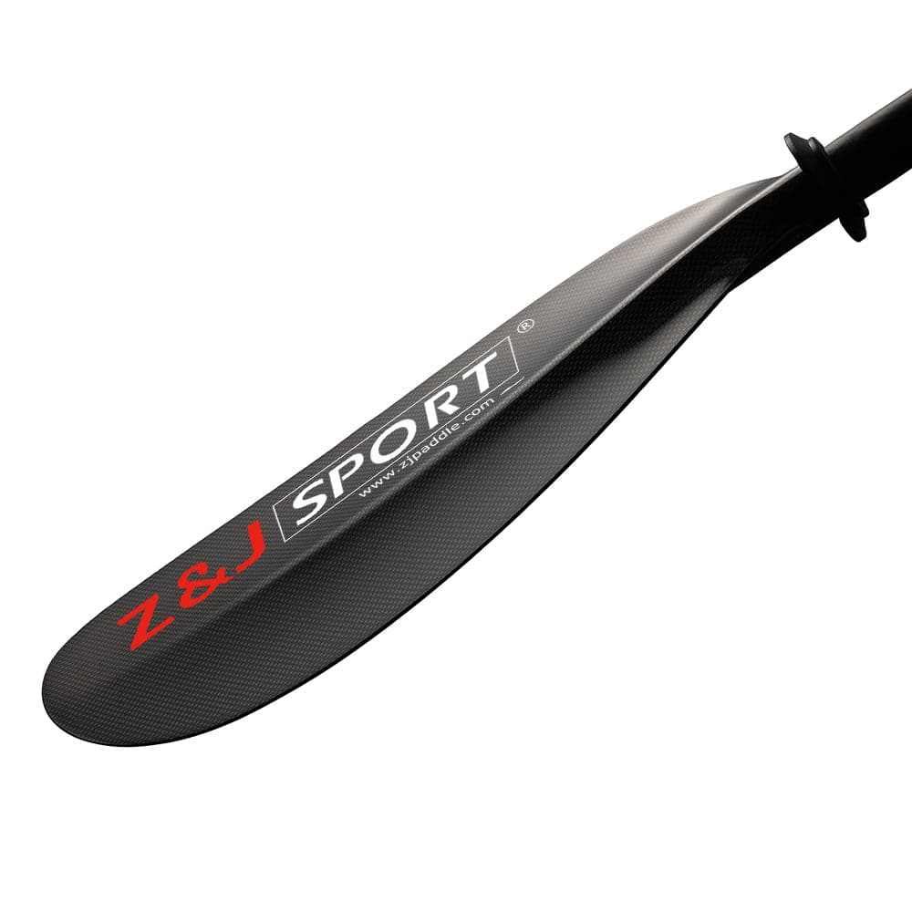 Close-up of a ZJ SPORT paddle blade featuring an asymmetrical carbon fiber texture. The ZJ SPORT logo is in white and red, perfect for long-distance kayaking.
