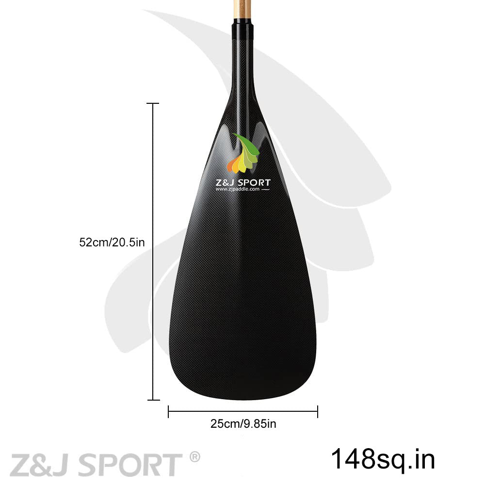 The image features a ZJ SPORT blade for outrigger canoe paddles, made of black carbon fiber with a PMI foam core. It measures 52cm by 25cm, covering an area of 148 sq in, and displays the Z&J SPORT logo with a stylized flame.