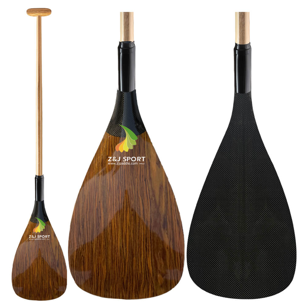 Three paddle views show handcrafted wood shafts and black blades. The left paddle has a wood-textured blade, a leaf logo, and ZJ SPORT. The two paddles on the right highlight the carbon blade designs of the ZJ Hybrid Outrigger Canoe Paddle by ZJ SPORT, available at a discount.