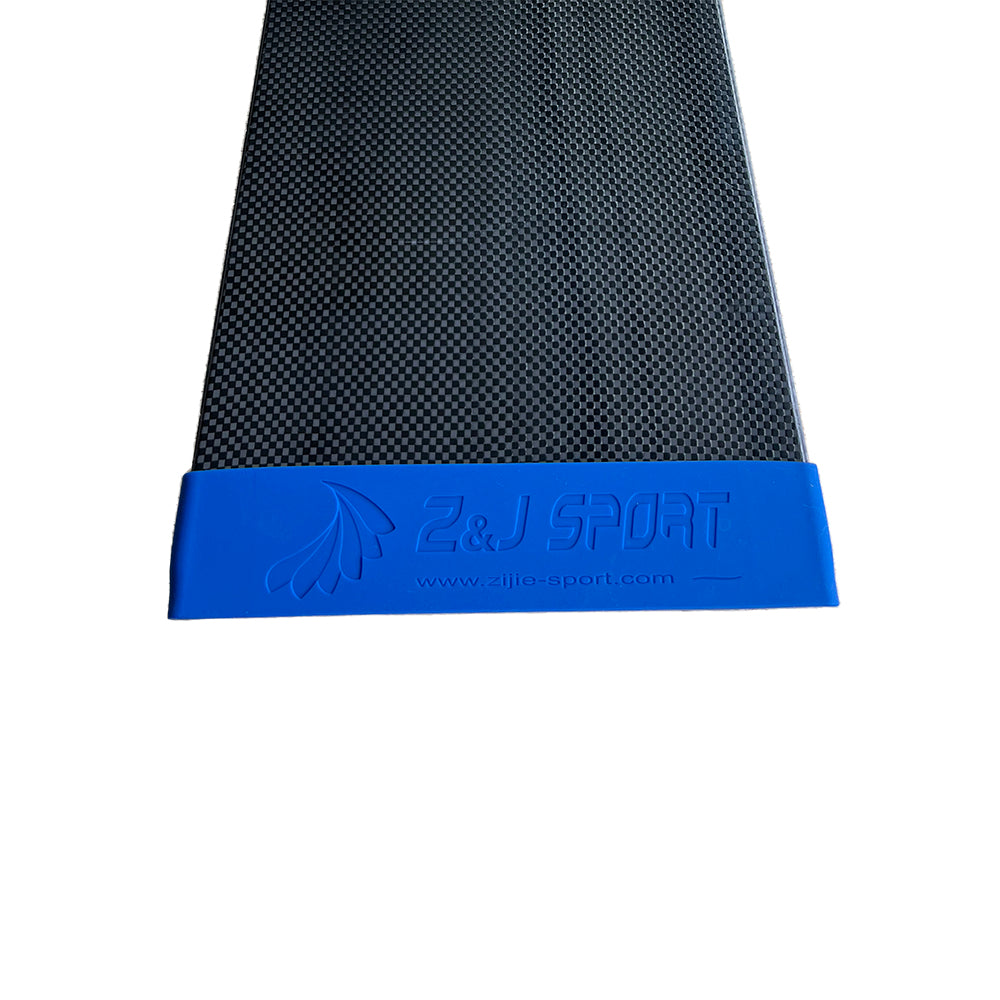 Close-up of a carbon-patterned surface showcasing the ZJ Paddle Blade Tip Protector for Dragon Boat Paddle, with a silicone end cap at the bottom. The subtle blue design and ZJ SPORT logo enhance the blue end cap, featuring their website.
