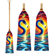 The ZJ SPORT ZJ IDBF Approved Wooden Dragon Boat Paddle With Fiberglass Reinforcement (WDP) showcases a vibrant dragon design swirling around a radiant sun and ocean waves, set against a vivid sunset sky. The dragons rich blues contrast beautifully with the paddles oranges and yellows.