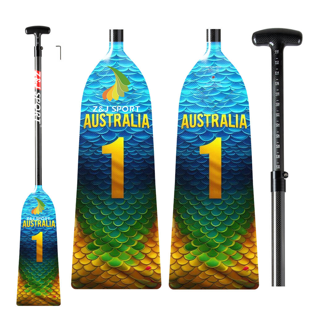 The ZJ Adjustable Carbon Dragon Boat Paddle by ZJ SPORT features a vibrant fish scale pattern, IDBF approval, and the number 1 with Z&J Sport Australia. Made from full carbon fiber, it includes a handle with a length-measuring scale.