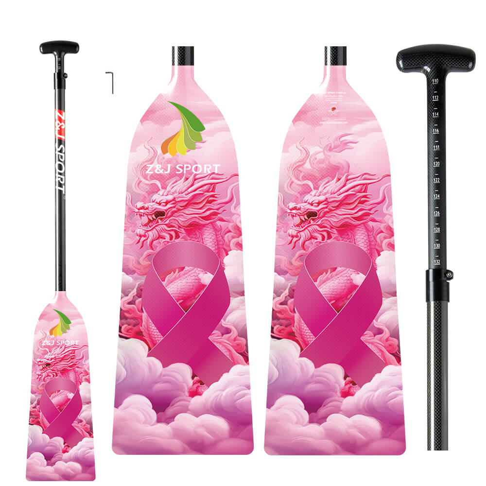 The ZJ SPORT ZJ IDBF Approved Carbon PINK Series Dragon Boat Paddle features a pink dragon and ribbon design for breast cancer awareness, with a carbon fiber build and an adjustable black handle marked for precise measurements to ensure top performance and comfort.