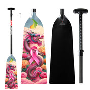 The ZJ SPORT ZJ IDBF Approved Carbon PINK Series Dragon Boat Paddle features a vivid dragon design with a pink ribbon and floral accents. The handle has an adjustable measurement guide, combining style and functionality in its striking carbon fiber build.