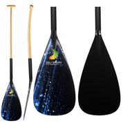 Three ZJ Factory Second Hybrid Carbon Outrigger Canoe Paddles for VAA WAKA feature wooden handles and black blades with a starry night design and colorful comet logo. One paddle is shown fully, another as a blade close-up, while the third has a side view showing minor imperfections for authenticity.