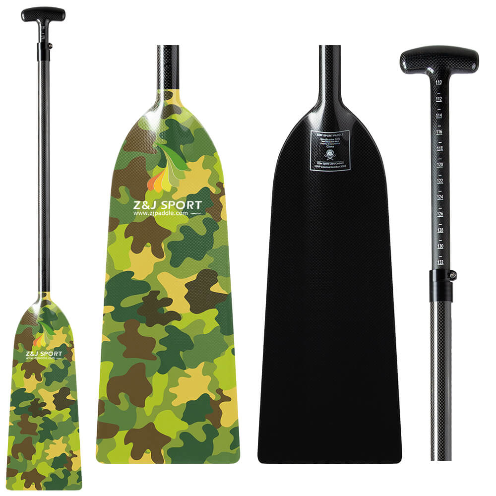 Two canoe paddles are displayed: the ZJ SPORT with a camouflage design, Z&J SPORT text, and a plain black carbon fiber paddle. Both feature T-shaped handles and reinforced shafts for strength and durability.
