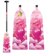 A vibrant pink dragon boat paddle features a striking dragon, clouds, and pink ribbon design with ZJ SPORT text. Its designed as an adjustable length paddle from the ZJ IDBF Approved Carbon PINK Series.