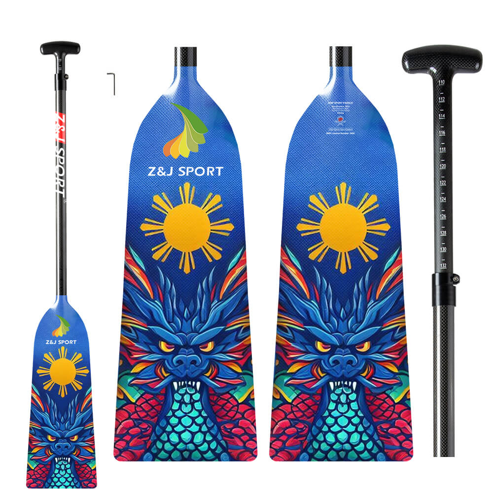 ZJ SPORTs ZJ Adjustable Carbon Dragon Boat Paddle, IDBF approved, showcases a colorful dragon design on a blue background with a yellow sun. Made from full carbon fiber, it features an adjustable black grip and Z&J SPORT branding.