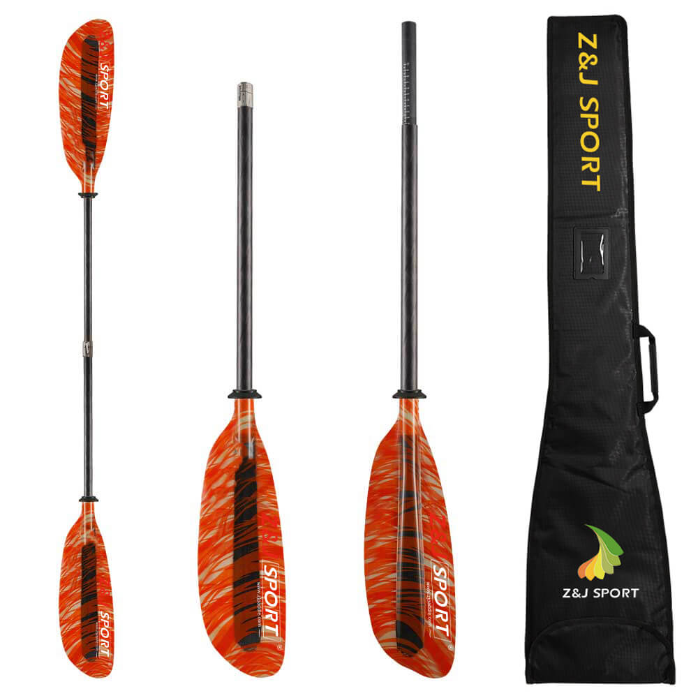 The image displays the ZJ SPORT Sea Kayak Paddle, featuring fiberglass blades and a carbon fiber shaft in orange and black. It is shown fully assembled, in two pieces, and packed in a Z&J SPORT bag.
