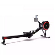 The Air Resistance Rowing Machine (PF-500/PF-550) is a sleek, foldable gym machine in black and red, featuring a rail-mounted seat, handlebar, digital display near the fan wheel, and a supportive base for stability.