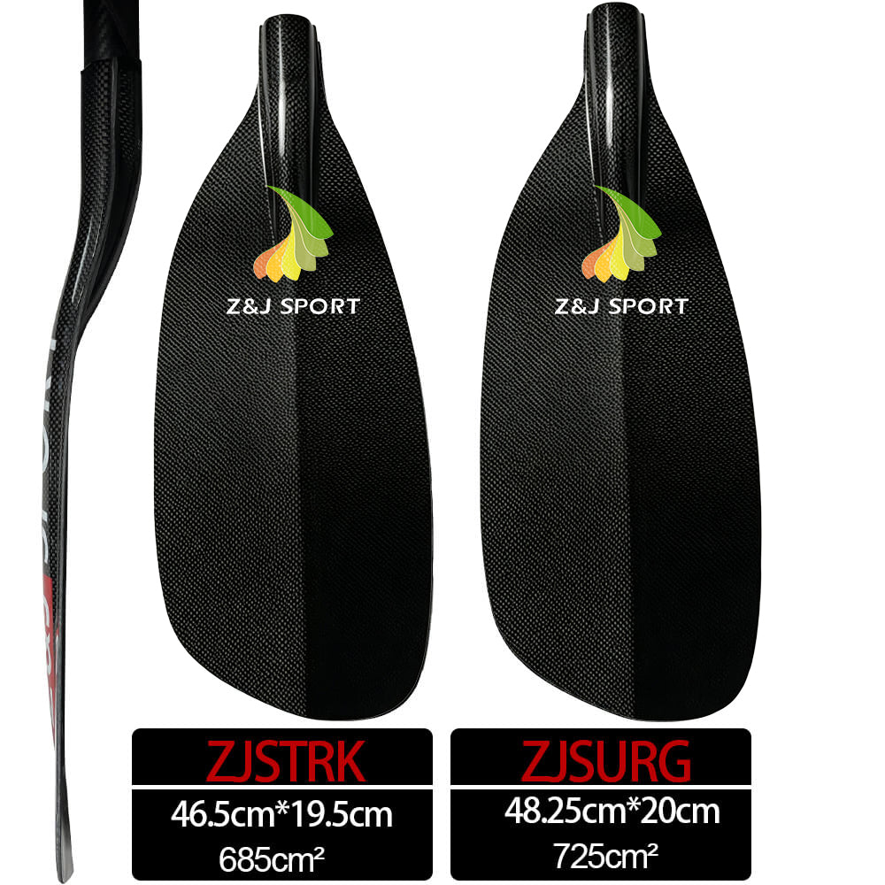 Two black carbon fiber paddles branded Z&J SPORT are ideal for river running. The left ZJSTRK paddle measures 46.5x19.5cm, covering 685cm², and the right ZJSURG paddle for whitewater is 48.25x20cm. Product: ZJ Carbon Whitewater Paddle With Forward Blade Straight Shaft by ZJ SPORT.