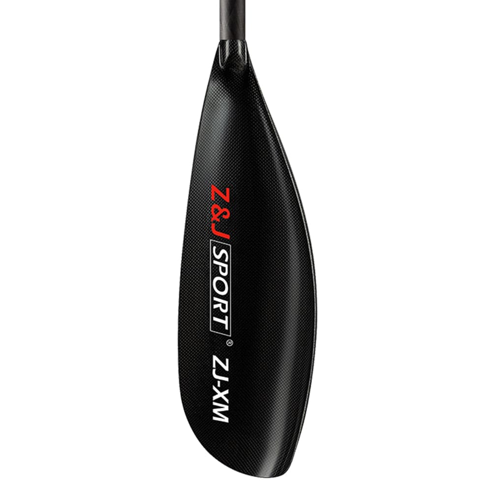 The ZJ X Series Carbon Fiber Kayak Surfski Paddle by ZJ SPORT has a textured black carbon fiber blade with an asymmetrical shape, red and white branding, and a reinforced edge for durability.