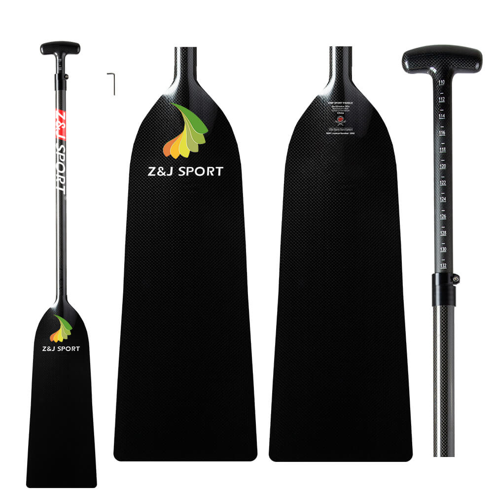 A sleek paddle graphic shows a black carbon fiber kayak paddle with an ergonomic T-grip handle. It features ZJ SPORT branding, an adjustable shaft, and a multi-colored abstract blade design. The IDBF-approved ZJ IDBF Approved Carbon Adjustable Paddle ensures top-tier performance.