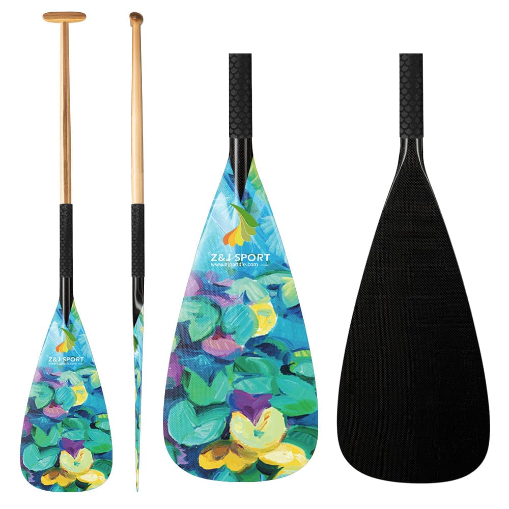 Three colorful ZJ Hybrid Outrigger Canoe Steering Paddles feature painted leaf and flower designs with durable handcrafted wood shafts. The left two paddles show the front and side views, while the right one shows a black back with a carbon blade. ZJ SPORT logo is visible on the front.