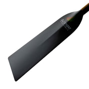 Close-up of a black carbon fiber paddle with a textured surface, featuring the ZJ SPORT logo and carbon.com in white on the blade. It has an IDBF-approved wooden shaft. The background is a plain white.