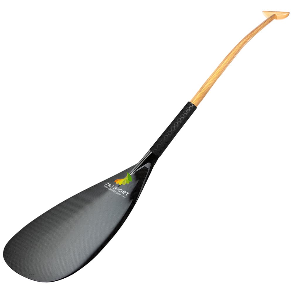 The ZJ SPORT Hybrid Outrigger Canoe Paddle boasts a carbon blade, anti-skid grip, and a handcrafted upper bent/straight wood shaft with a T-handle, adorned with an elegant leaf logo on the black blade.